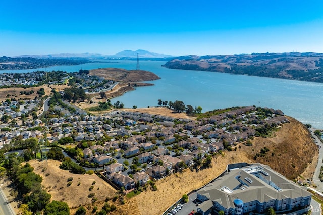 bird's eye view with a water and mountain view