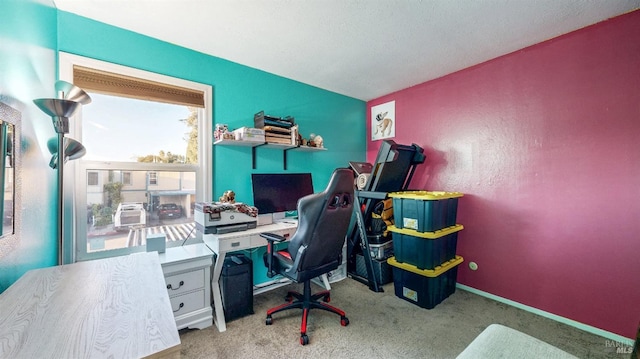 office featuring baseboards and carpet floors