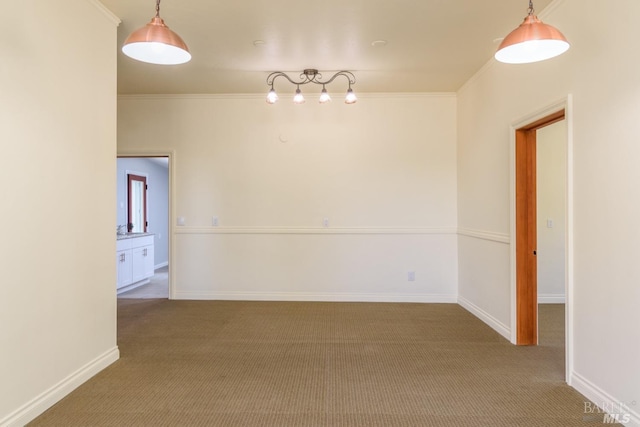 unfurnished room featuring carpet floors and crown molding