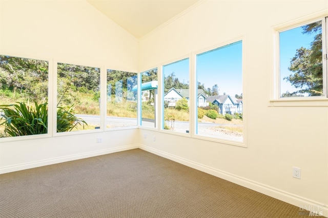 unfurnished sunroom featuring lofted ceiling