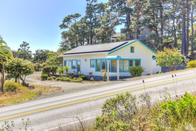 view of front of home with solar panels