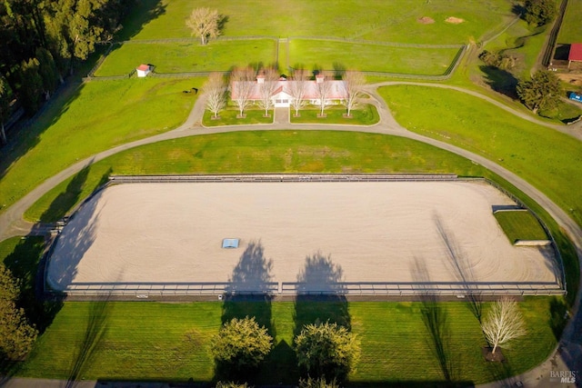 birds eye view of property featuring a rural view