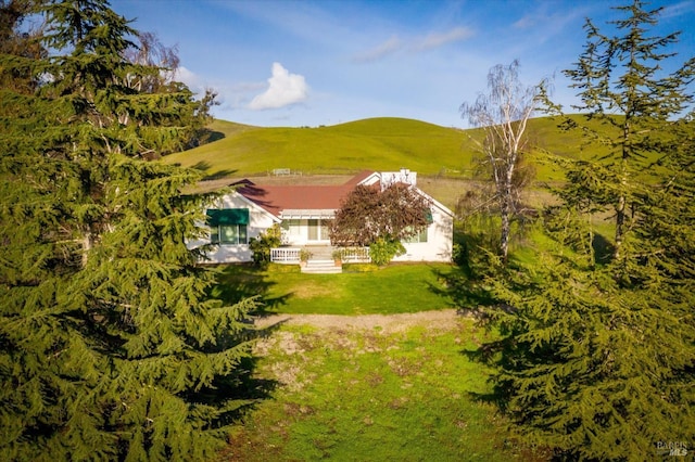 birds eye view of property featuring a mountain view