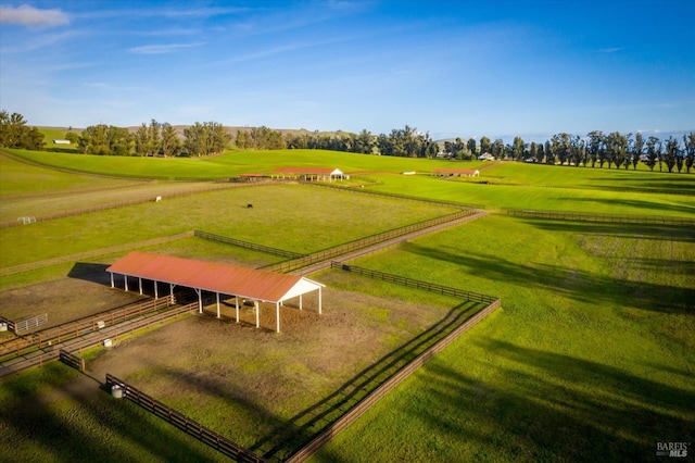 birds eye view of property featuring a rural view