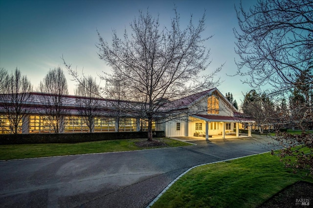 view of front of house with a yard