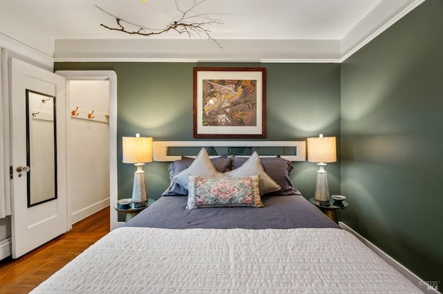 bedroom with hardwood / wood-style floors