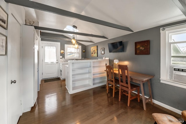 dining room with vaulted ceiling with beams and dark wood-type flooring