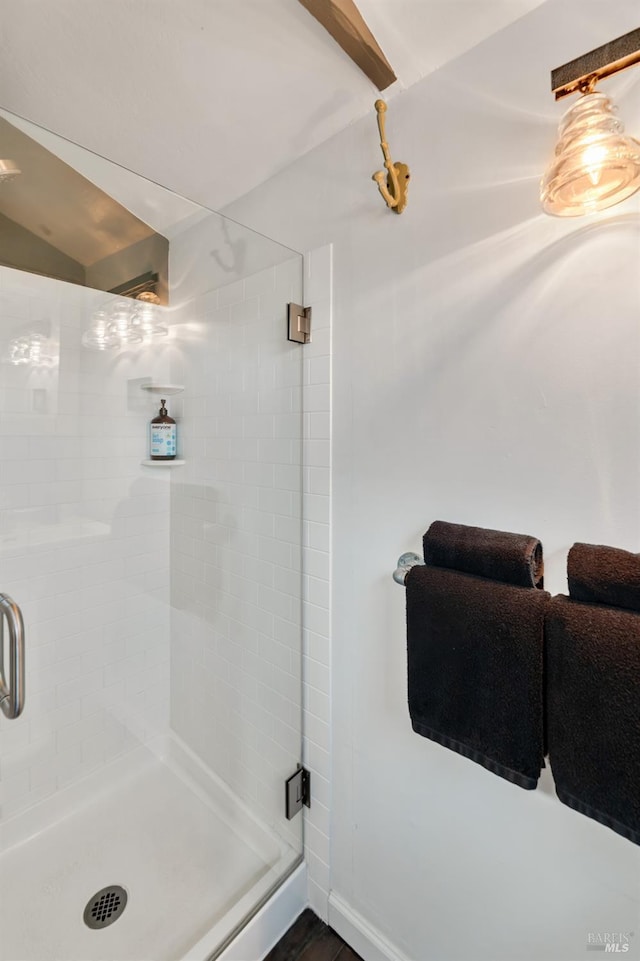 bathroom featuring an enclosed shower