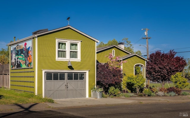 view of front of property with a garage