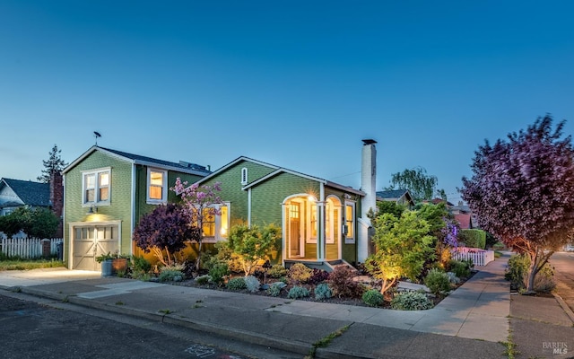 view of front of property featuring a garage