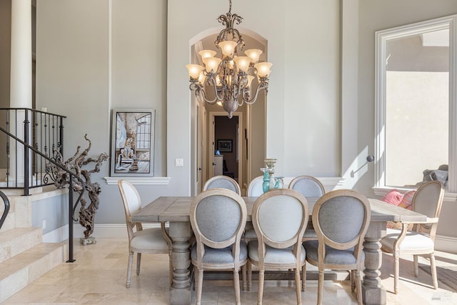 dining room with a chandelier