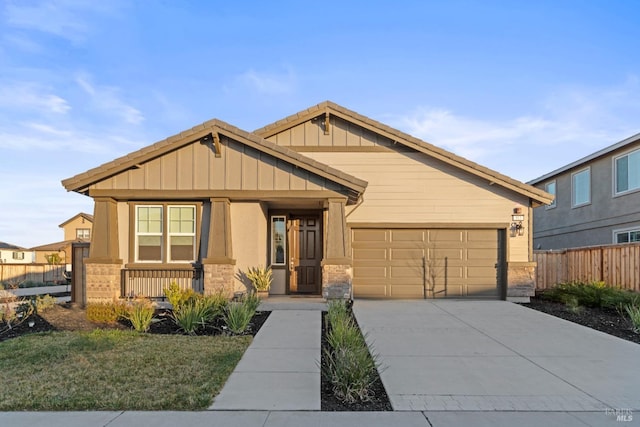 craftsman house with a garage and a porch