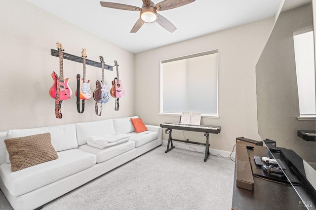 living room with carpet floors and ceiling fan