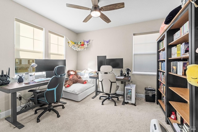 carpeted office with ceiling fan