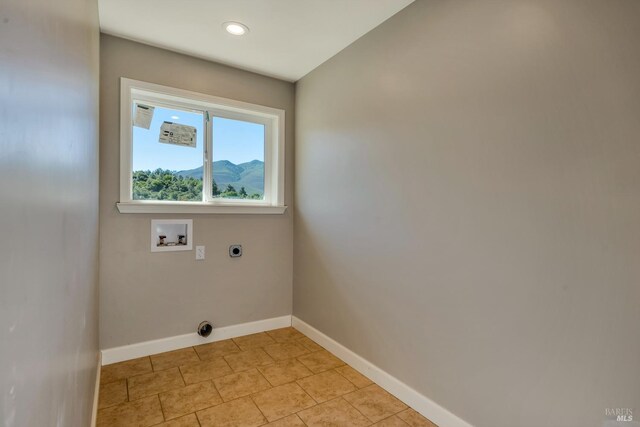 laundry area with a mountain view, hookup for a washing machine, and hookup for an electric dryer