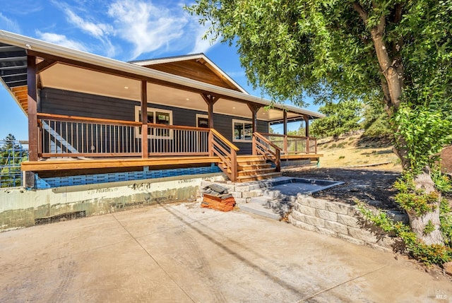 view of front of home featuring a patio area