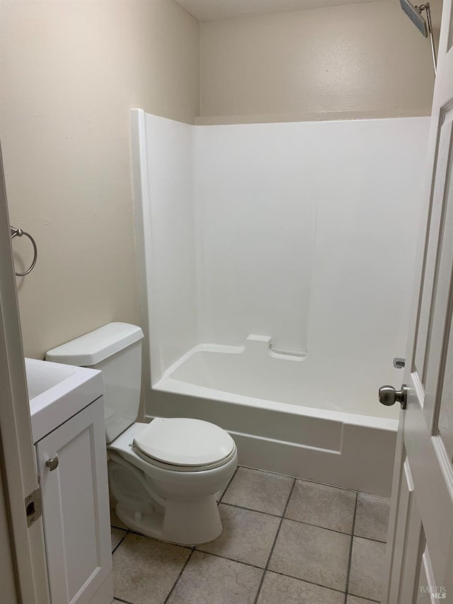 full bathroom with vanity, tile patterned floors, toilet, and bathtub / shower combination