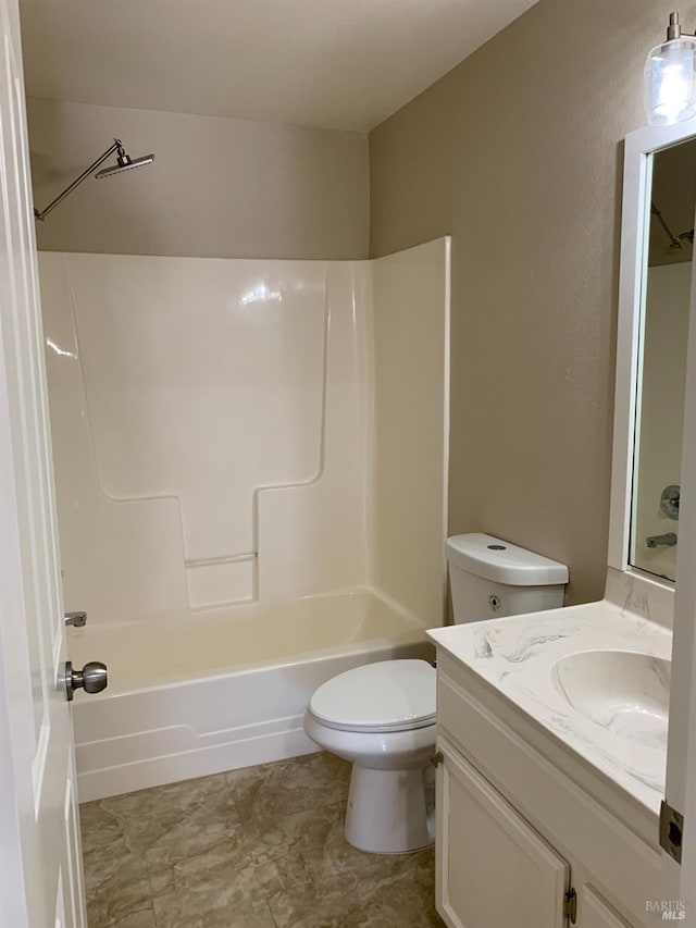 full bathroom with vanity, bathtub / shower combination, and toilet