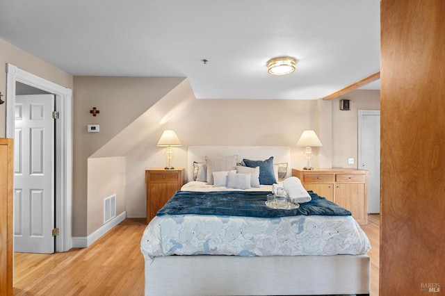 bedroom featuring light wood-type flooring