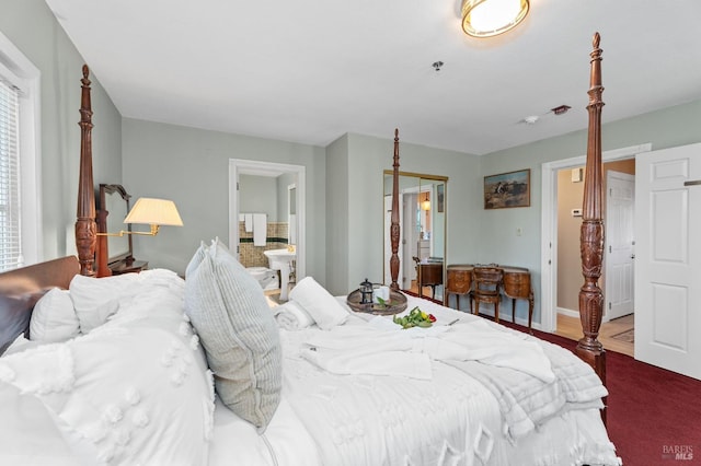 bedroom featuring ensuite bath