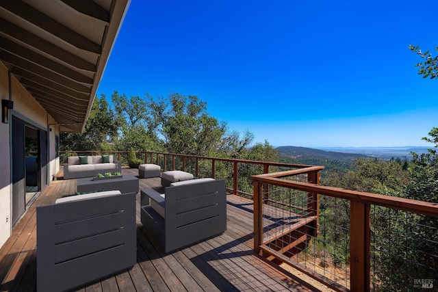 deck with an outdoor hangout area