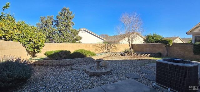 view of yard featuring central AC