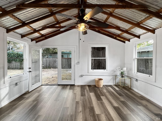 unfurnished sunroom with ceiling fan, french doors, and lofted ceiling with beams