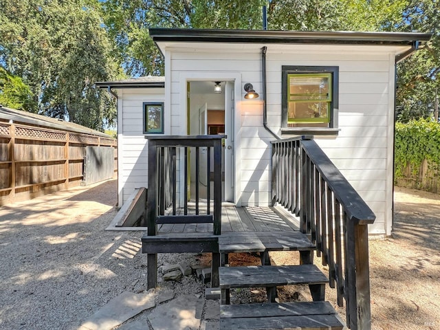 exterior space featuring a wooden deck