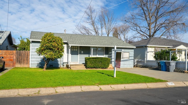 ranch-style home with a front yard