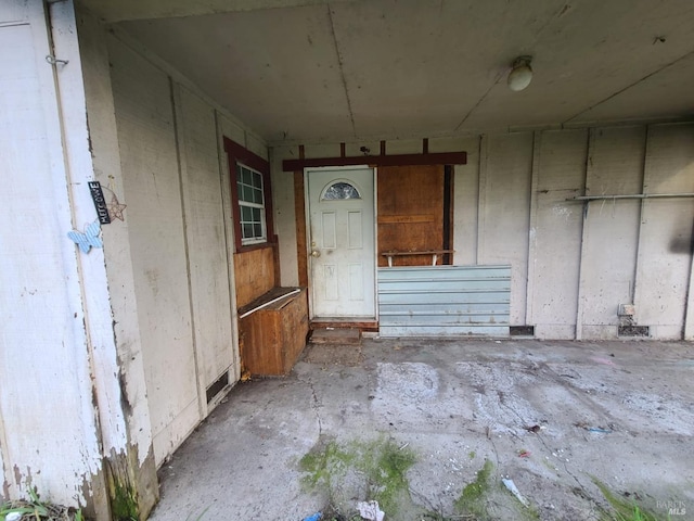 misc room with concrete flooring