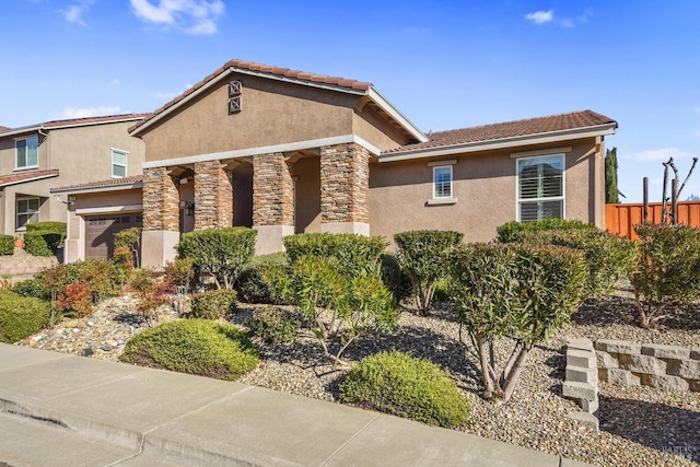 view of front of property featuring a garage