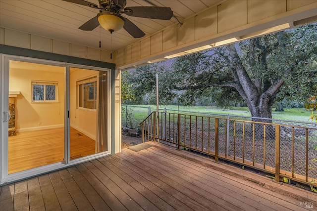 wooden deck with ceiling fan