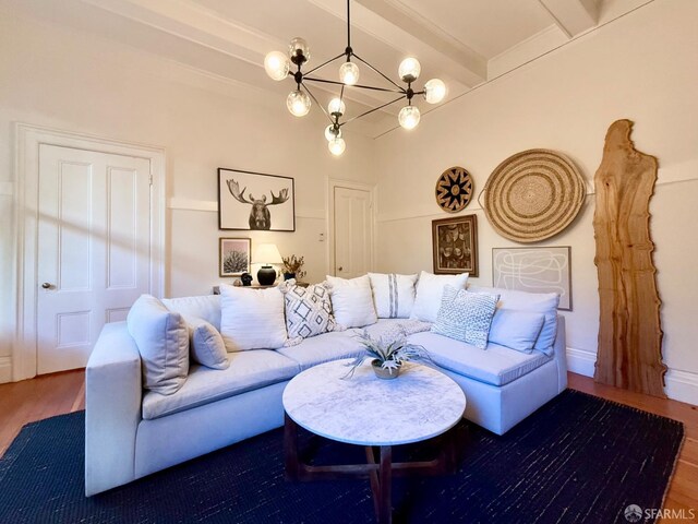 living room featuring an inviting chandelier, beam ceiling, and hardwood / wood-style floors