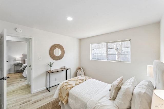 bedroom featuring light hardwood / wood-style flooring