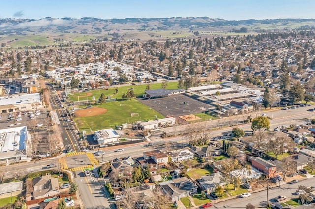 drone / aerial view featuring a mountain view