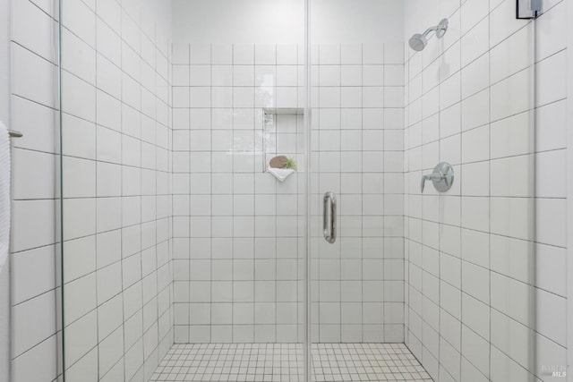 bathroom with an enclosed shower