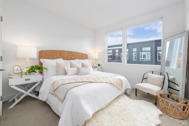 bedroom featuring carpet