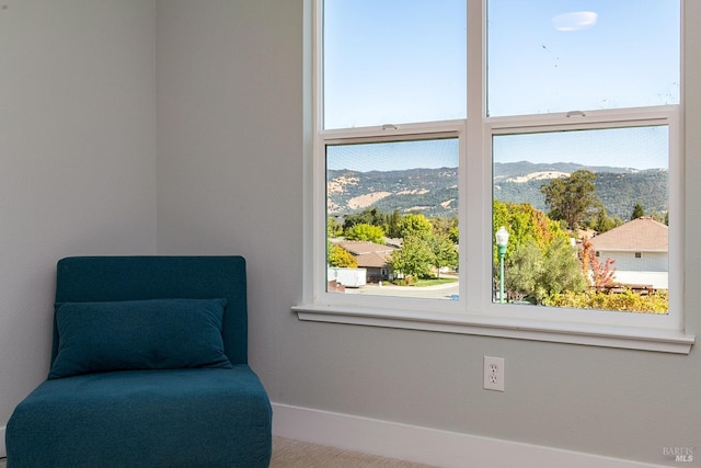 sitting room featuring a mountain view