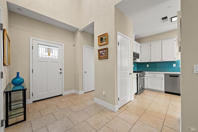 view of tiled entrance foyer