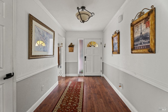 entryway featuring dark hardwood / wood-style flooring and ornamental molding