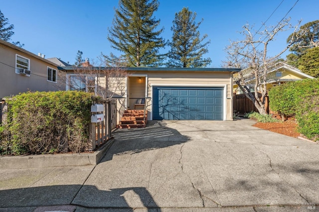 ranch-style house featuring a garage