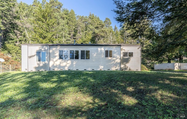 view of front of home with a front lawn