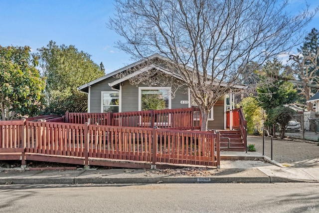 view of front of house featuring a wooden deck