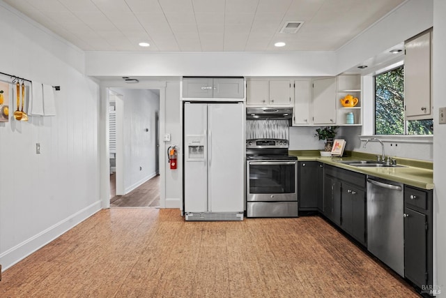 kitchen with under cabinet range hood, stainless steel appliances, a sink, visible vents, and open shelves