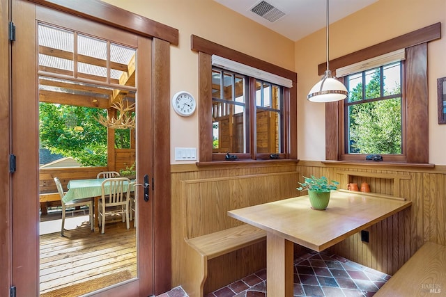 interior space featuring wood walls