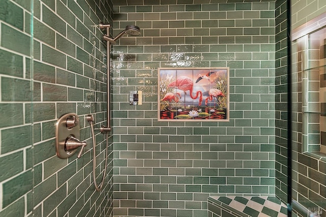 bathroom featuring tiled shower