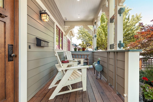 balcony featuring a porch