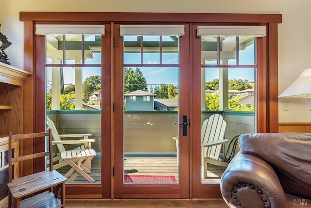 doorway to outside with french doors and a wealth of natural light