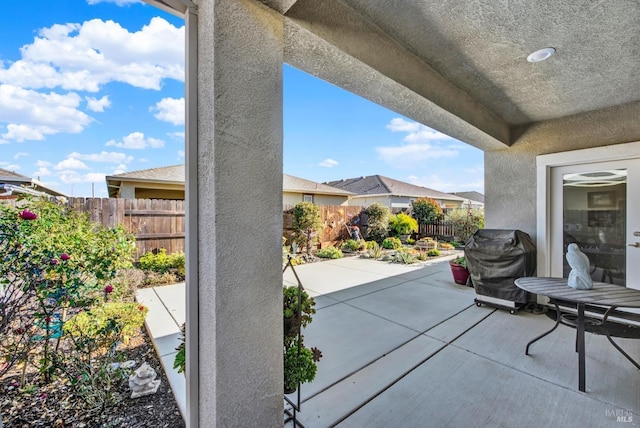 view of patio with a grill