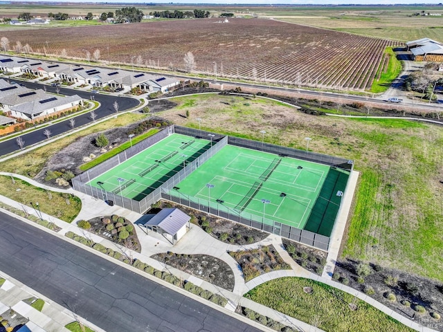 birds eye view of property with a rural view